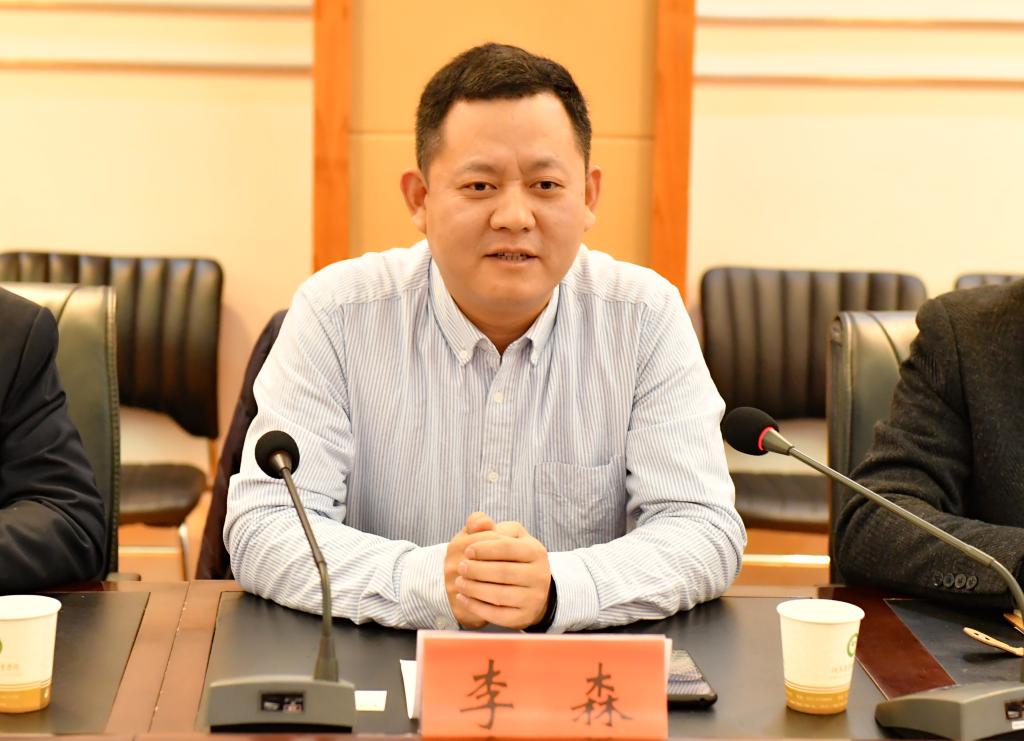 河南万邦国际农产品物流股份有限公司集团常务副总经理李森一行来我校
